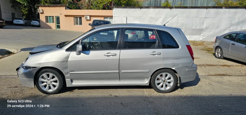 Suzuki Liana, снимка 5 - Автомобили и джипове - 47792019