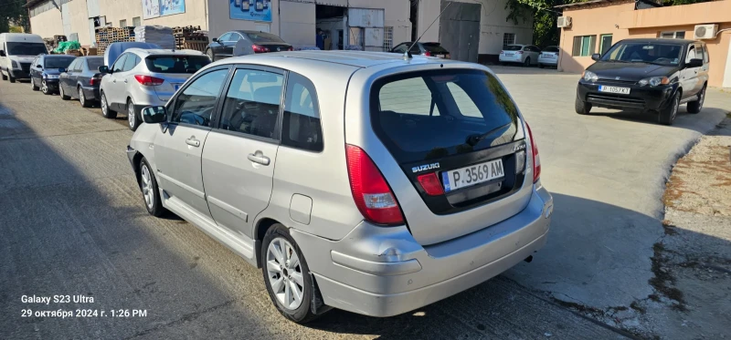 Suzuki Liana, снимка 4 - Автомобили и джипове - 47792019