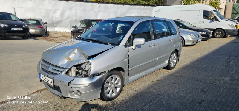 Suzuki Liana, снимка 6 - Автомобили и джипове - 47792019