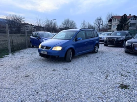 VW Touran 1.9 TDI 105 кс 7 Местен Перфектен - 3600 € / 7040.99 лв. - 35139699 11
