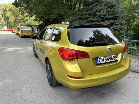 Opel Astra Sports Tourer 1.3, снимка 6 - Автомобили и джипове - 44727850