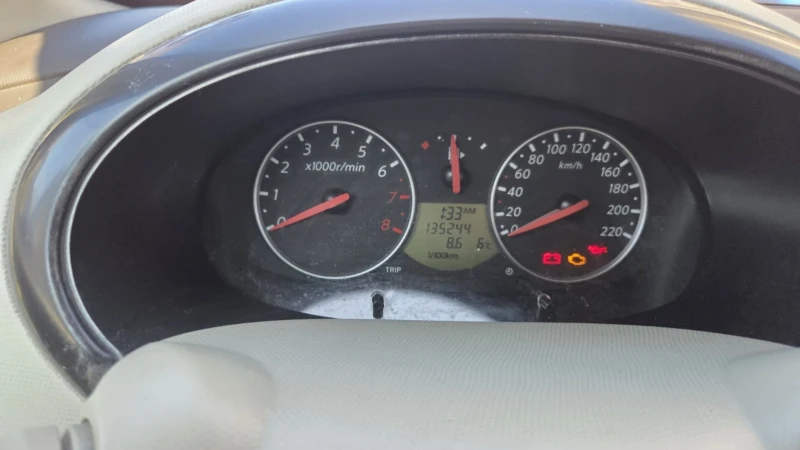 Nissan Micra 1.4 88кс.автоматик, снимка 10 - Автомобили и джипове - 53497646