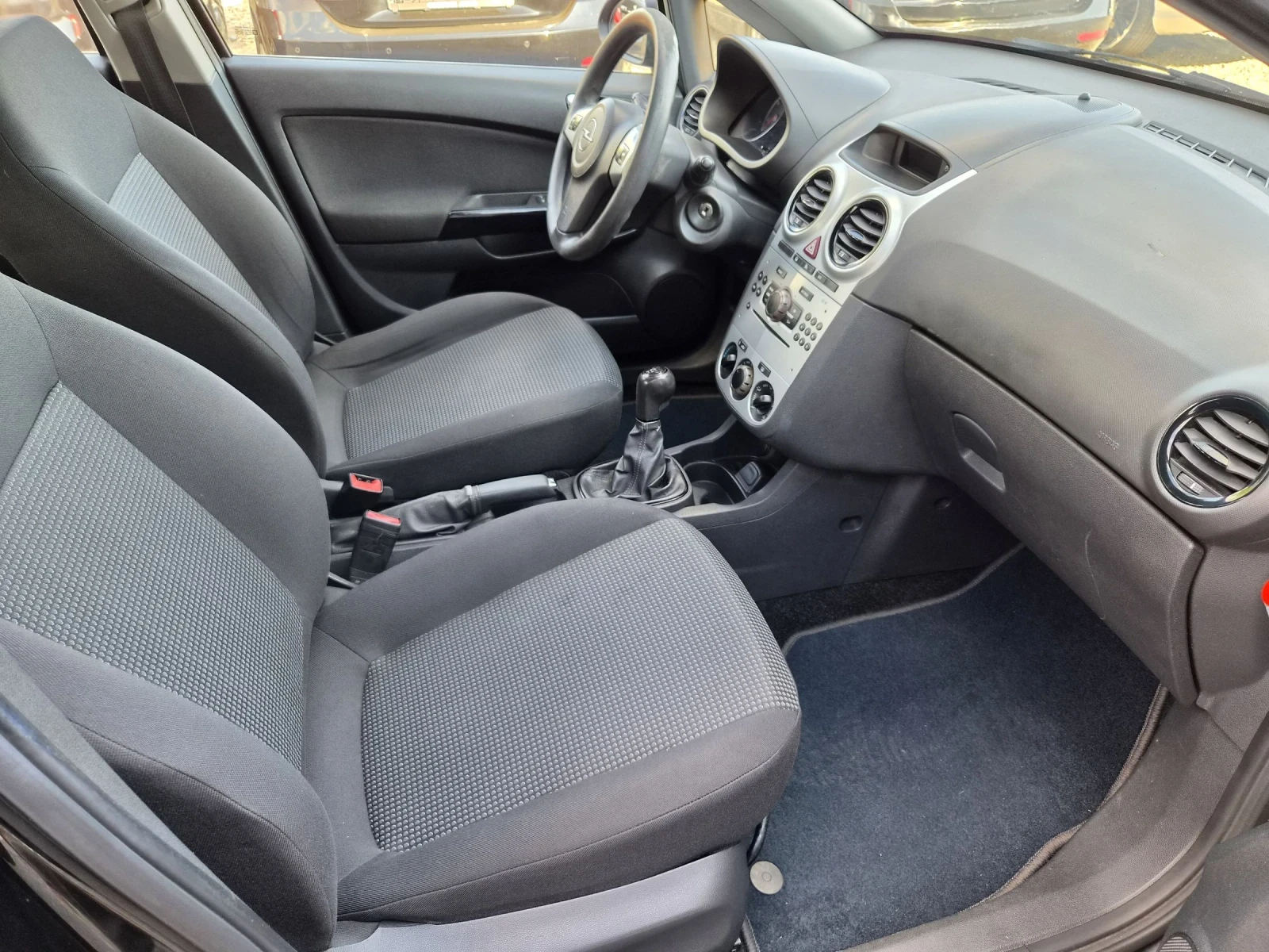 Opel Corsa 1.3CDTI, снимка 11 - Автомобили и джипове - 53165398