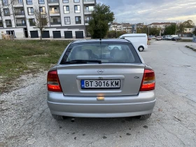 Opel Astra 1.8 - 2799 лв. / 1431.11 € - 51796923 4
