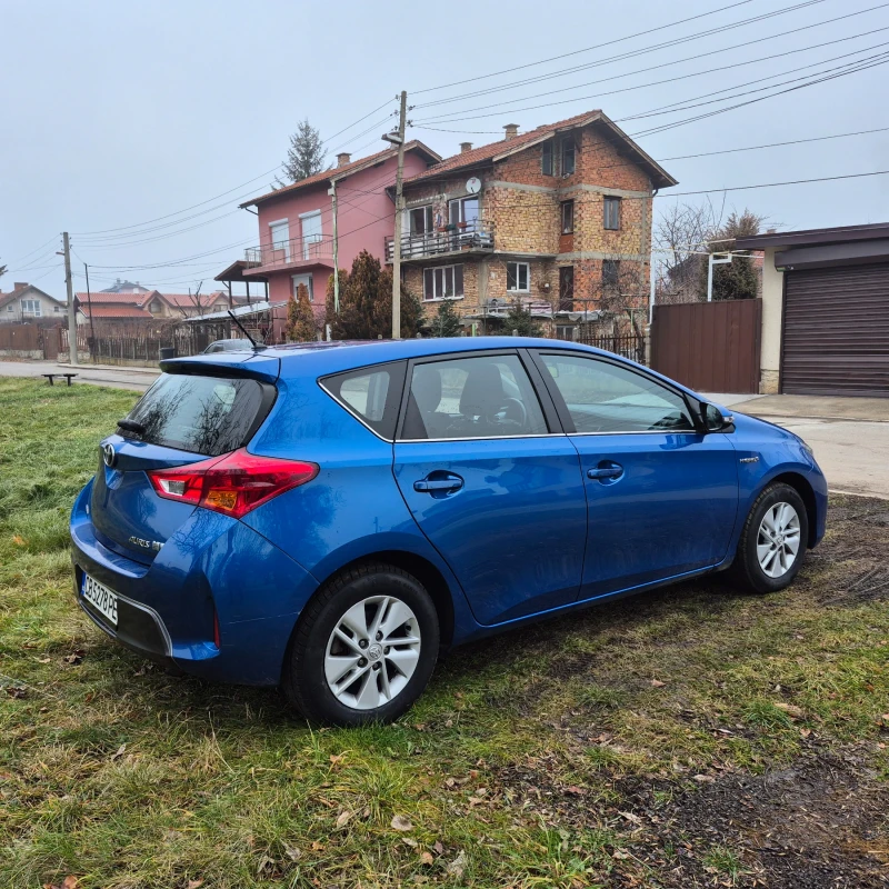 Toyota Auris 1.8 Hybrid* Обслужен * Лизинг * Бартер, снимка 4 - Автомобили и джипове - 48412541