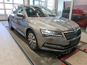 ������ Skoda Superb