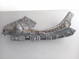 Водач държач под ляв фар Субару Форестър (я)