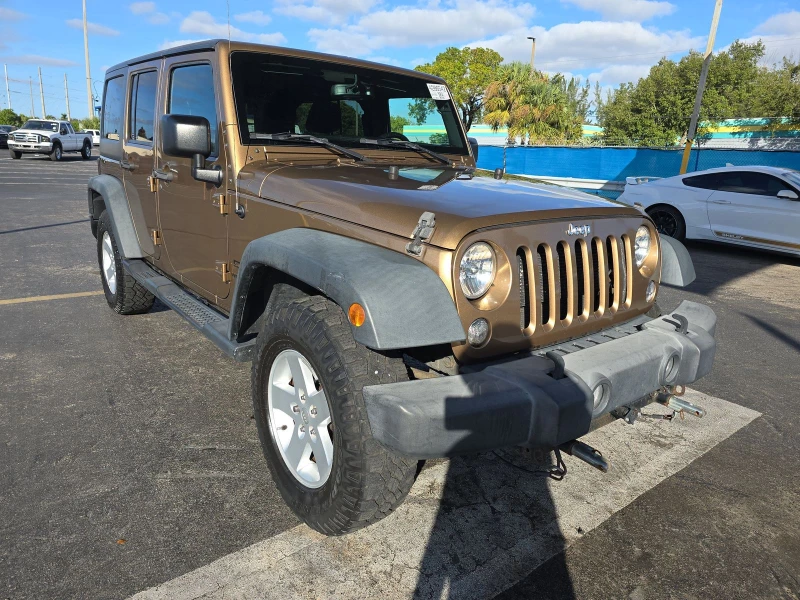 Jeep Wrangler 2015 Jeep Wrangler Unlimited Sport, снимка 3 - Автомобили и джипове - 48327401