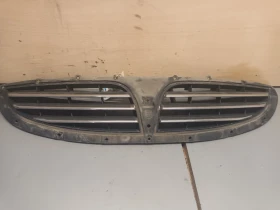 решетка между фаровете Санг Йонг Кайрон 2.0д