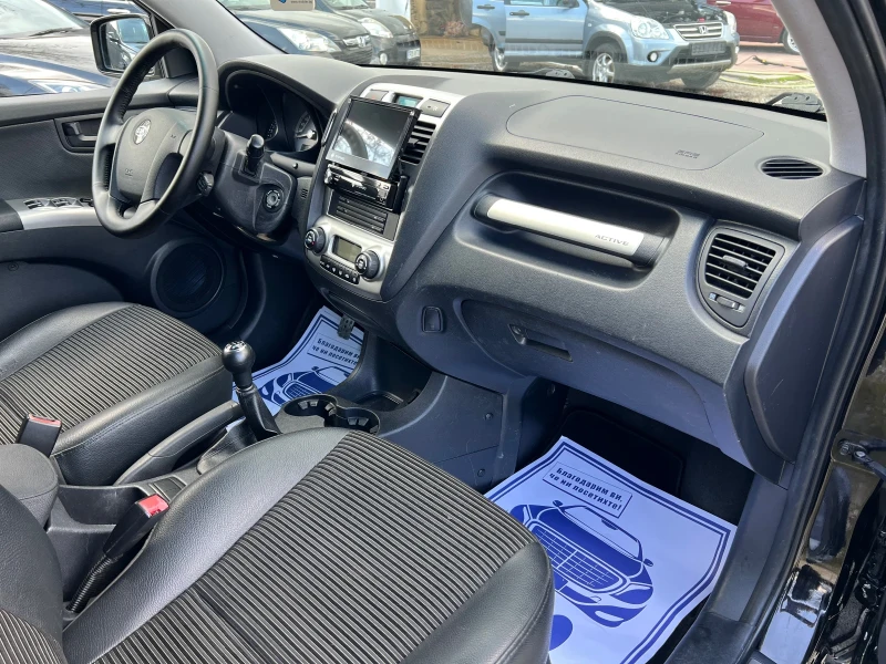 Kia Sportage II 2.0* AWD* ШВЕЙЦАРИЯ* НАВИ* , снимка 15 - Автомобили и джипове - 50042917
