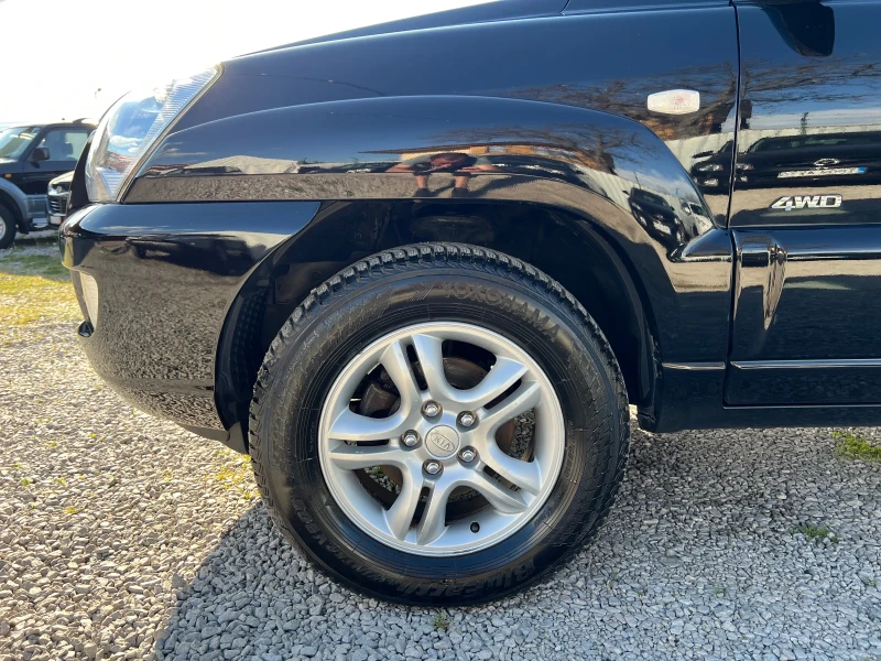 Kia Sportage II 2.0* AWD* ШВЕЙЦАРИЯ* НАВИ* , снимка 9 - Автомобили и джипове - 50042917