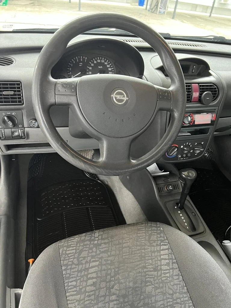 Opel Corsa 1.4 90, снимка 6 - Автомобили и джипове - 48332648