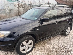     Mitsubishi Outlander 2.0,  