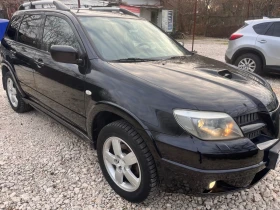     Mitsubishi Outlander 2.0,  