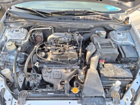 Mitsubishi Lancer 1.6i 95ks klima, снимка 11 - Автомобили и джипове - 45022486