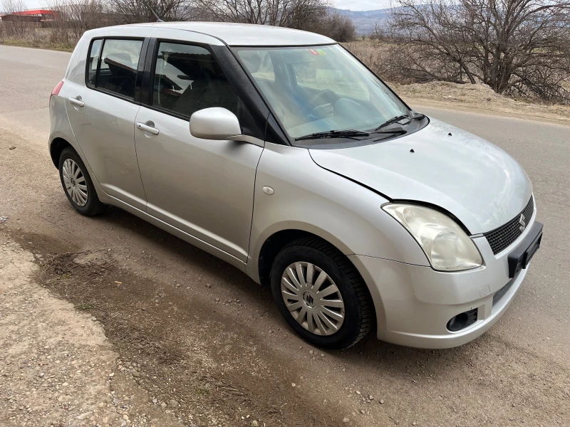 Suzuki Swift 1.3 4x4, снимка 4 - Автомобили и джипове - 49192513