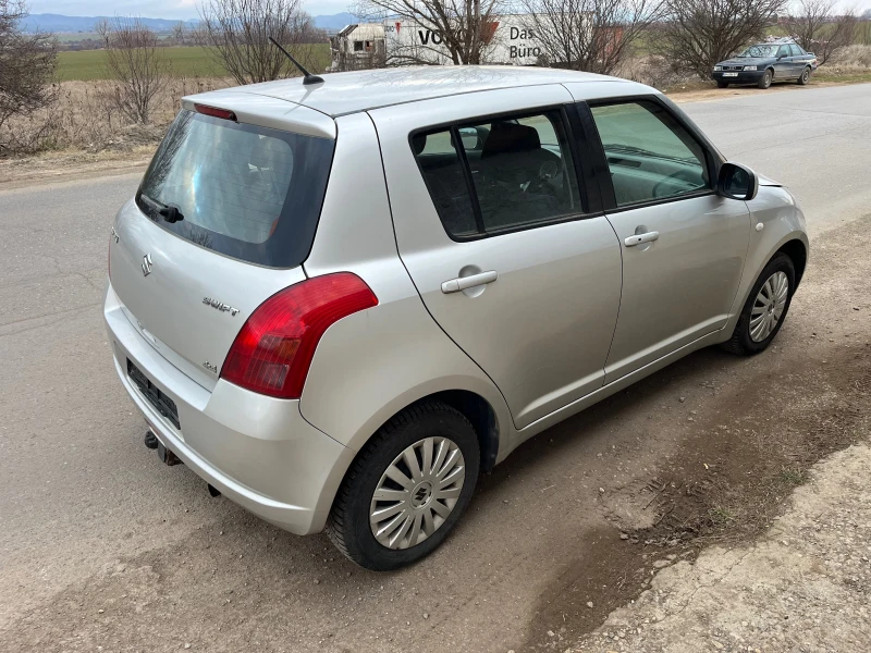 Suzuki Swift 1.3 4x4, снимка 8 - Автомобили и джипове - 49192513