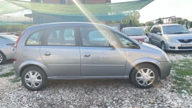 Opel Meriva 1.7 101кс Клима - 3200 лв. - 10154064 9