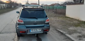 Mitsubishi Outlander 2.4 MIVEC, 160 К.С, ГАЗ, 4 ЕКОЛОГИЧНА ГРУПА!!!, снимка 6