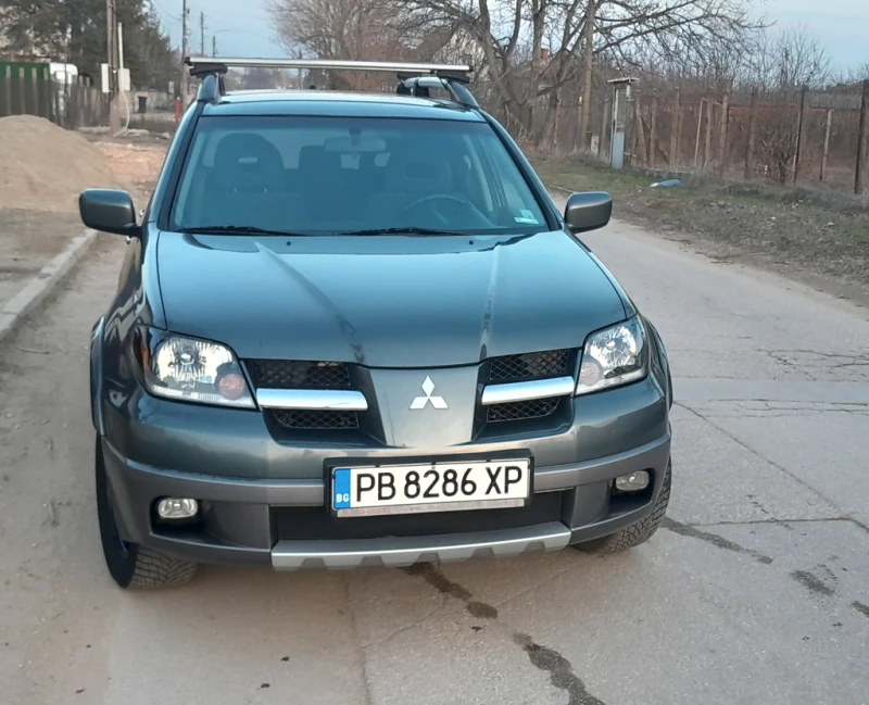 Mitsubishi Outlander 2.4 MIVEC, 160 К.С, ГАЗ, 4 ЕКОЛОГИЧНА ГРУПА!!!, снимка 1 - Автомобили и джипове - 49132115