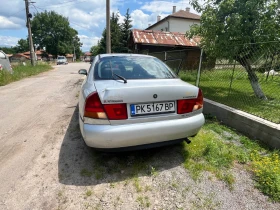 Mitsubishi Carisma, снимка 4