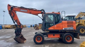 Багер DOOSAN DX 140 W-5, снимка 1