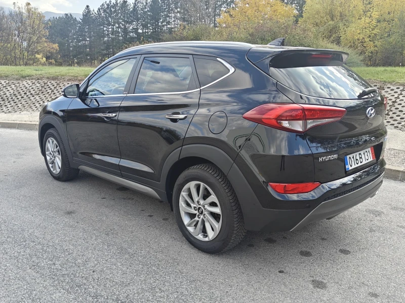 Hyundai Tucson Уникален/2.0/4х4, снимка 4 - Автомобили и джипове - 47779844