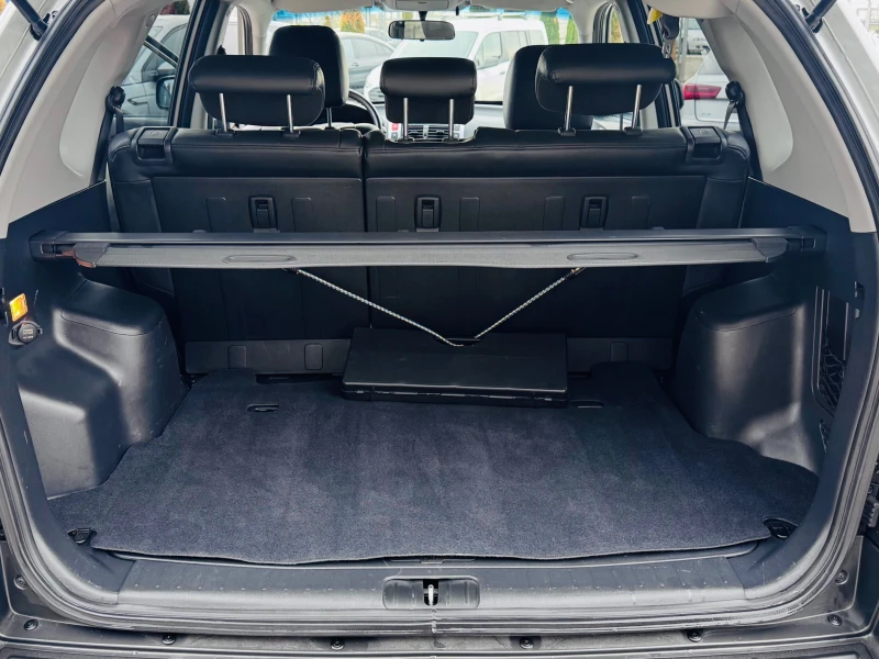 Hyundai Tucson 2.0CRDI-AUTOMATIC, снимка 15 - Автомобили и джипове - 53285202