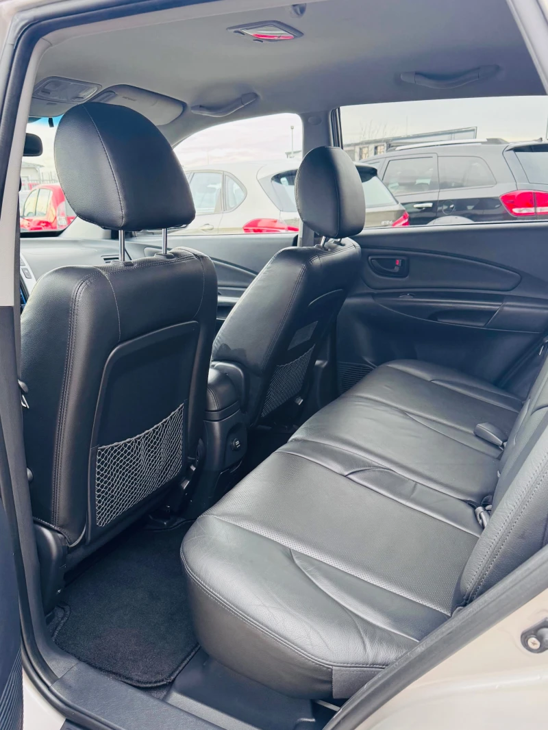 Hyundai Tucson 2.0CRDI-AUTOMATIC, снимка 13 - Автомобили и джипове - 53285202