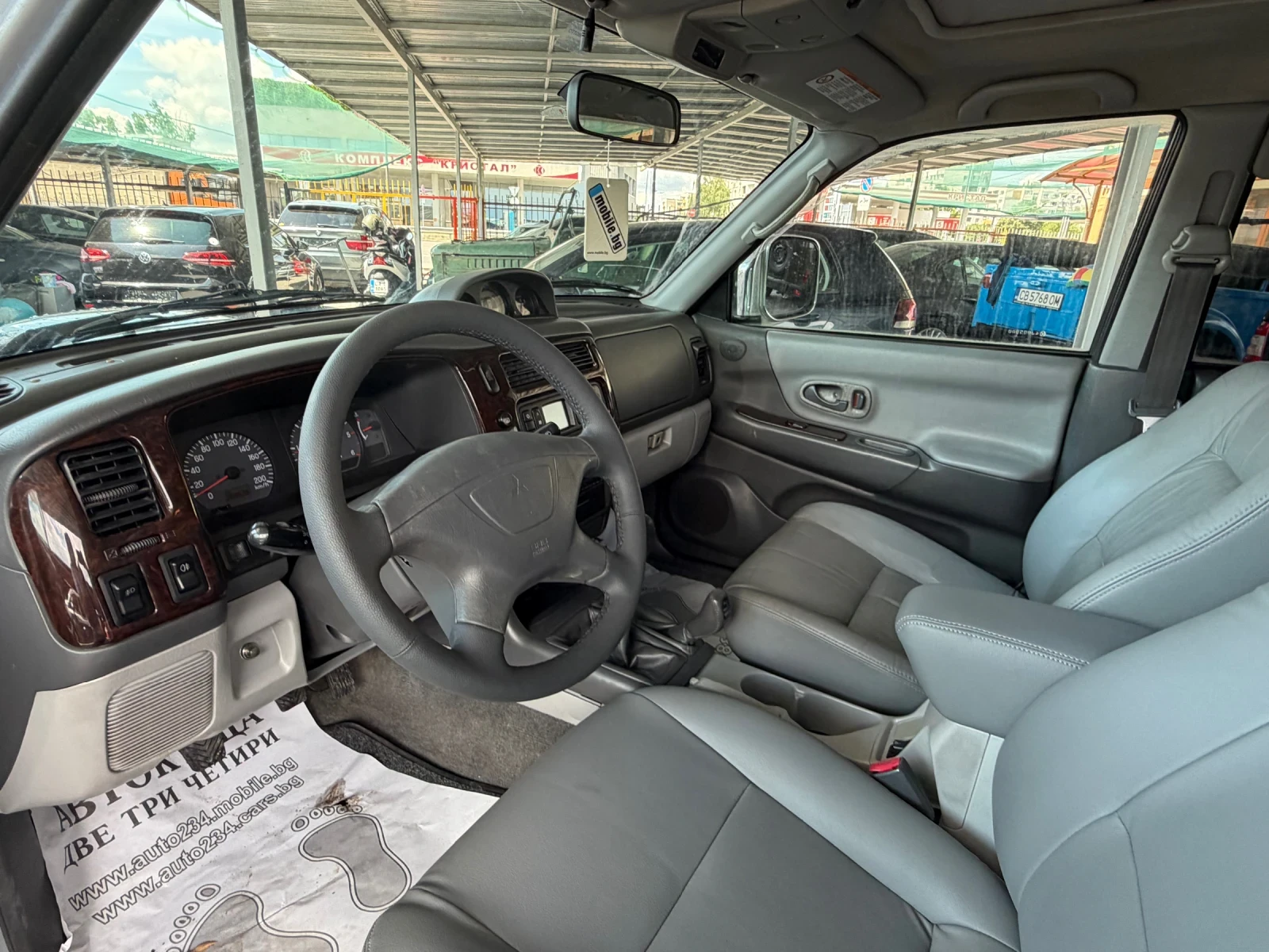 Mitsubishi Pajero sport 2.5d 4x4 КЛИМАТРОНИК КОЖА , снимка 17 - Автомобили и джипове - 55222586
