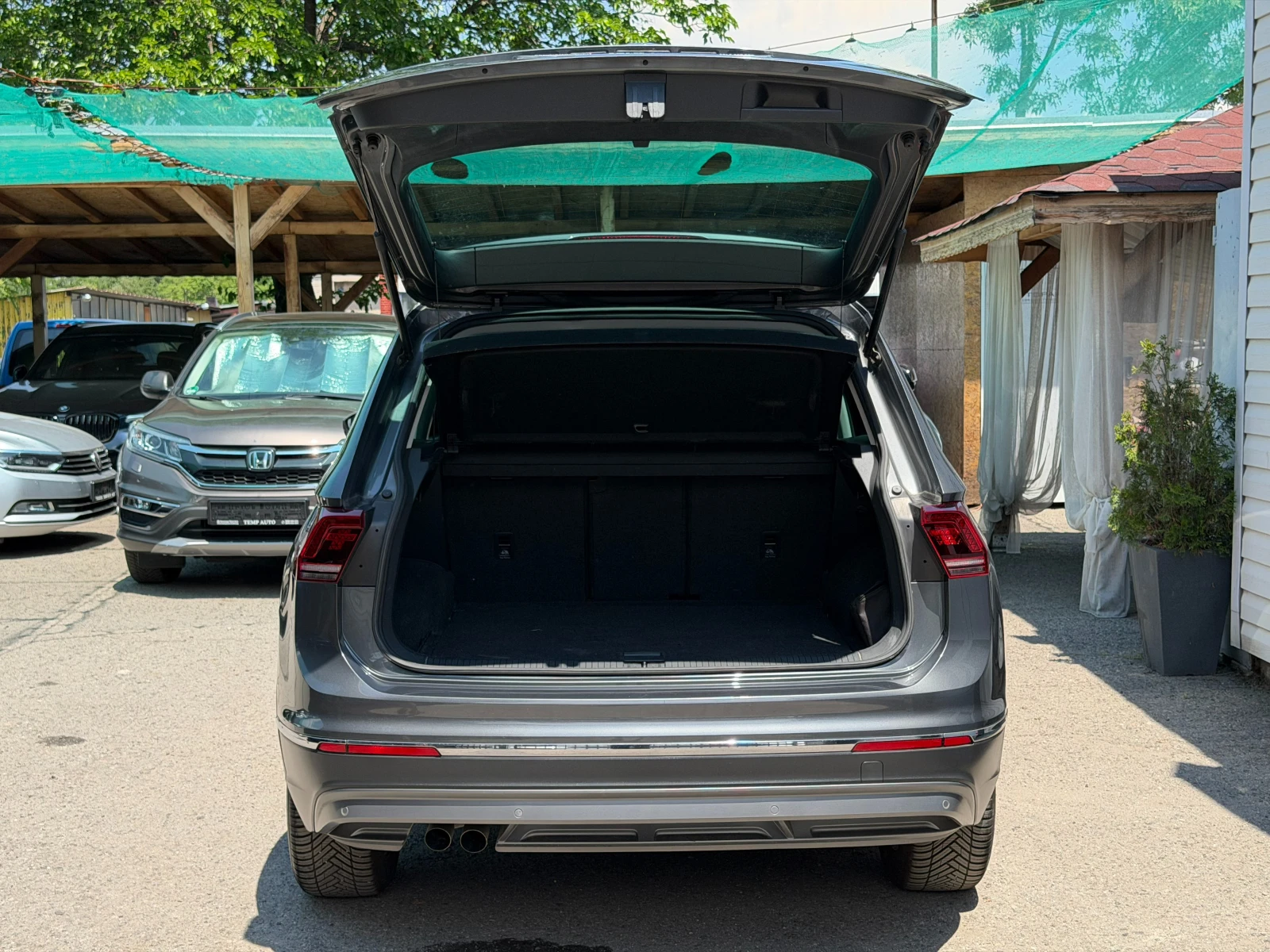 VW Tiguan 2.0TDI* 4x4* СЕРВИЗНА КНИЖКА С ПЪЛНА ИСТОРИЯ В VW, снимка 6 - Автомобили и джипове - 54871060