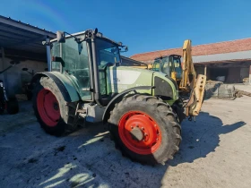 Трактор Claas Axos 340