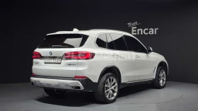 BMW X5 * HEAD-UP DISPLAY * ПАНОРАМА * DISTRONIC - 34480 € / 67437.02 лв. - 69631810 2