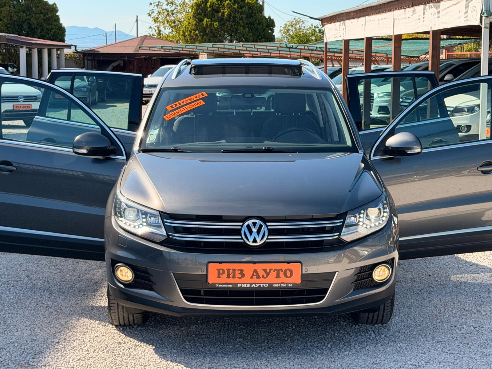 VW Tiguan 2.0TDI* NAVI* 100%км* FACE* KAMERA* НОВИЯ МОТОР, снимка 2 - Автомобили и джипове - 56132073