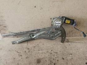 Стъклоповдигач заден десен Ssangyong Musso , снимка 1