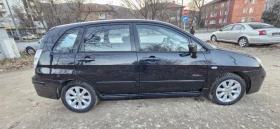 Suzuki Liana 1.6 бензин 107к.с. първи собственик 4х4 климатрони - [9] 