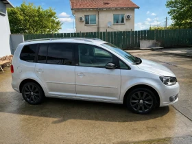������ VW Touran