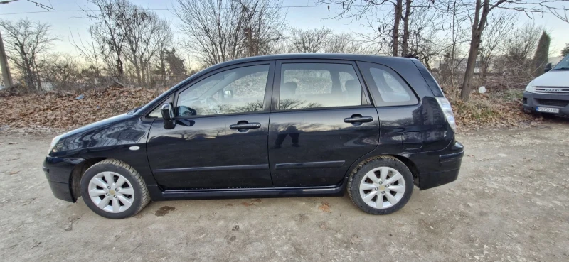 Suzuki Liana 1.6 бензин 107к.с. първи собственик 4х4 климатрони, снимка 4 - Автомобили и джипове - 48853296