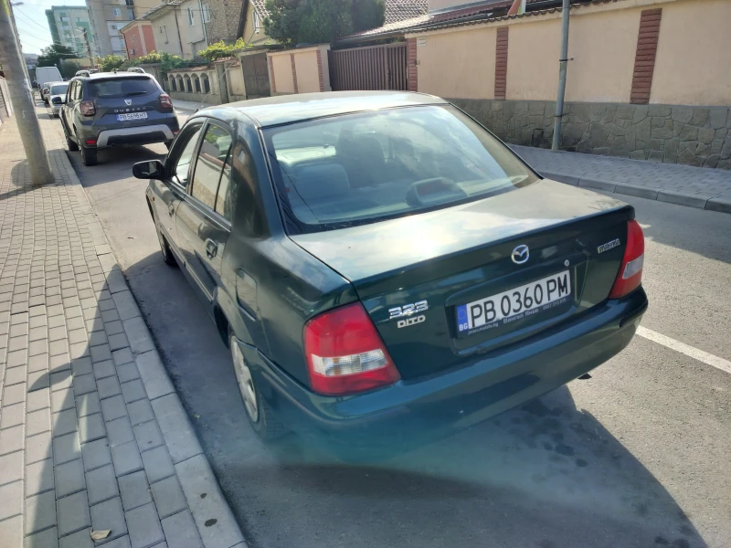 Mazda 323, снимка 2 - Автомобили и джипове - 47327696