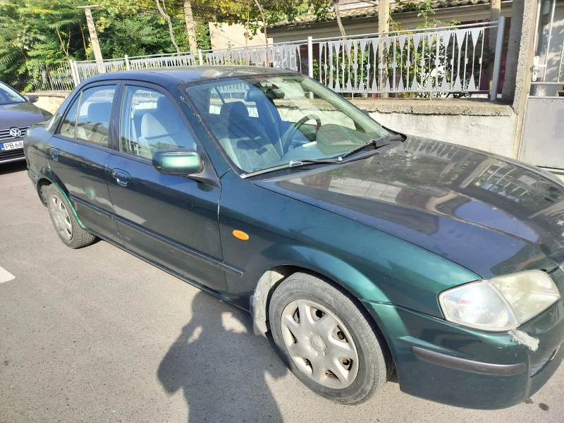 Mazda 323, снимка 1 - Автомобили и джипове - 47327696