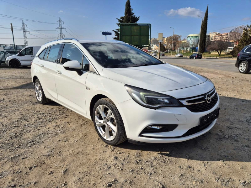 Opel Astra sport tourer, снимка 7 - Автомобили и джипове - 42511960