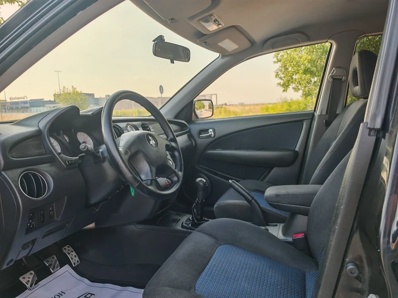 Mitsubishi Outlander 2.0 БЕНЗИН 136 К.С. ГАЗ УНИКАЛНО СЪСТОЯНИЕ!, снимка 8 - Автомобили и джипове - 51097400