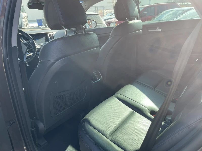 Hyundai Tucson 1.7 CDRi, снимка 11 - Автомобили и джипове - 53249157