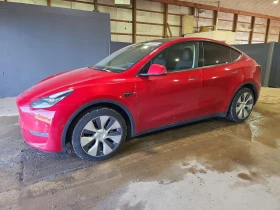 ������ Tesla Model Y
