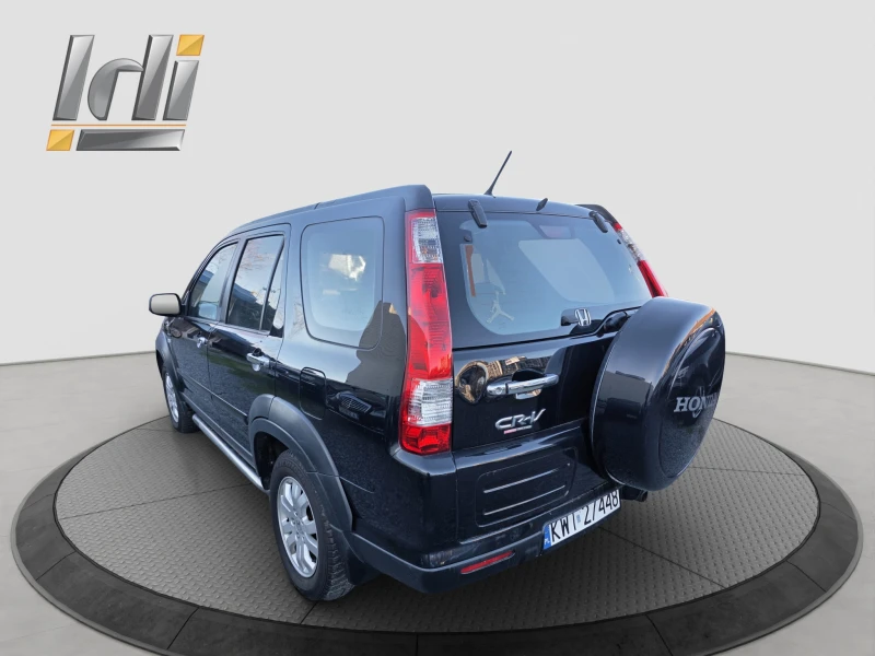 Honda Cr-v 2.0 V-tec, снимка 4 - Автомобили и джипове - 53047063