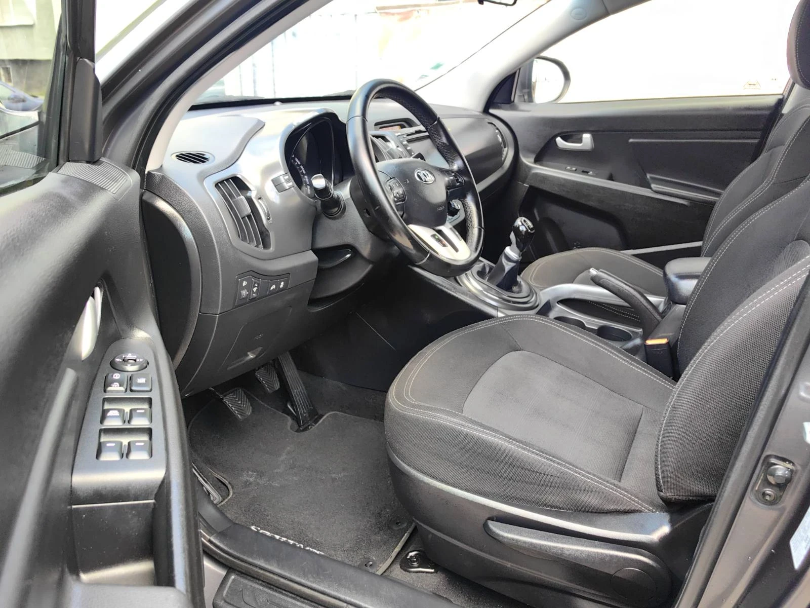 Kia Sportage 1.7 CRDI 116 к.с., снимка 14 - Автомобили и джипове - 54666609
