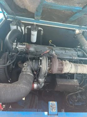 Багер Fuchs MHL 360 + грайфер, снимка 9