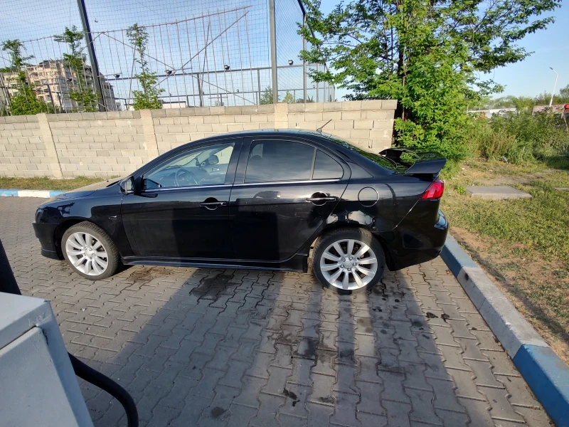 Mitsubishi Lancer 1.8 143 LPG, снимка 11 - Автомобили и джипове - 52635009