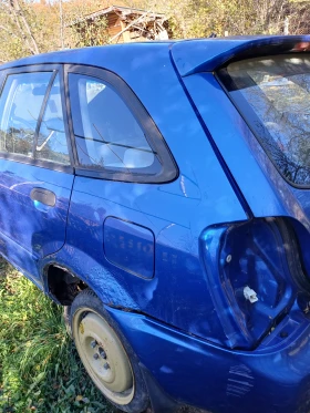 Mazda 323, снимка 11