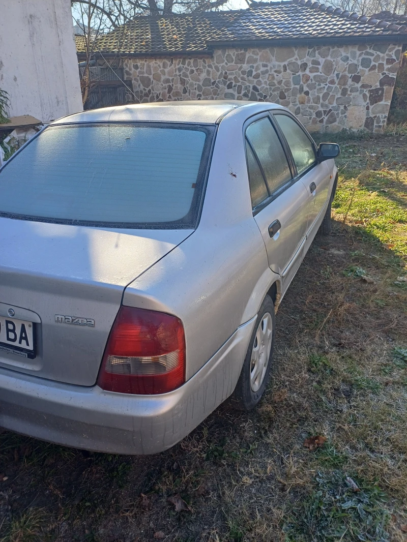 Mazda 323, снимка 1 - Автомобили и джипове - 47901264